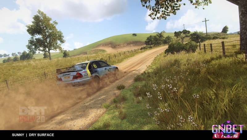 Xe rally vượt qua đoạn đường sỏi trơn trượt giữa rừng rậm New Zealand trong game pc đua xe DiRT Rally 2.0 